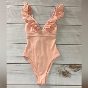 Love Story Lace Up Ruffle
One Piece Swimsuit